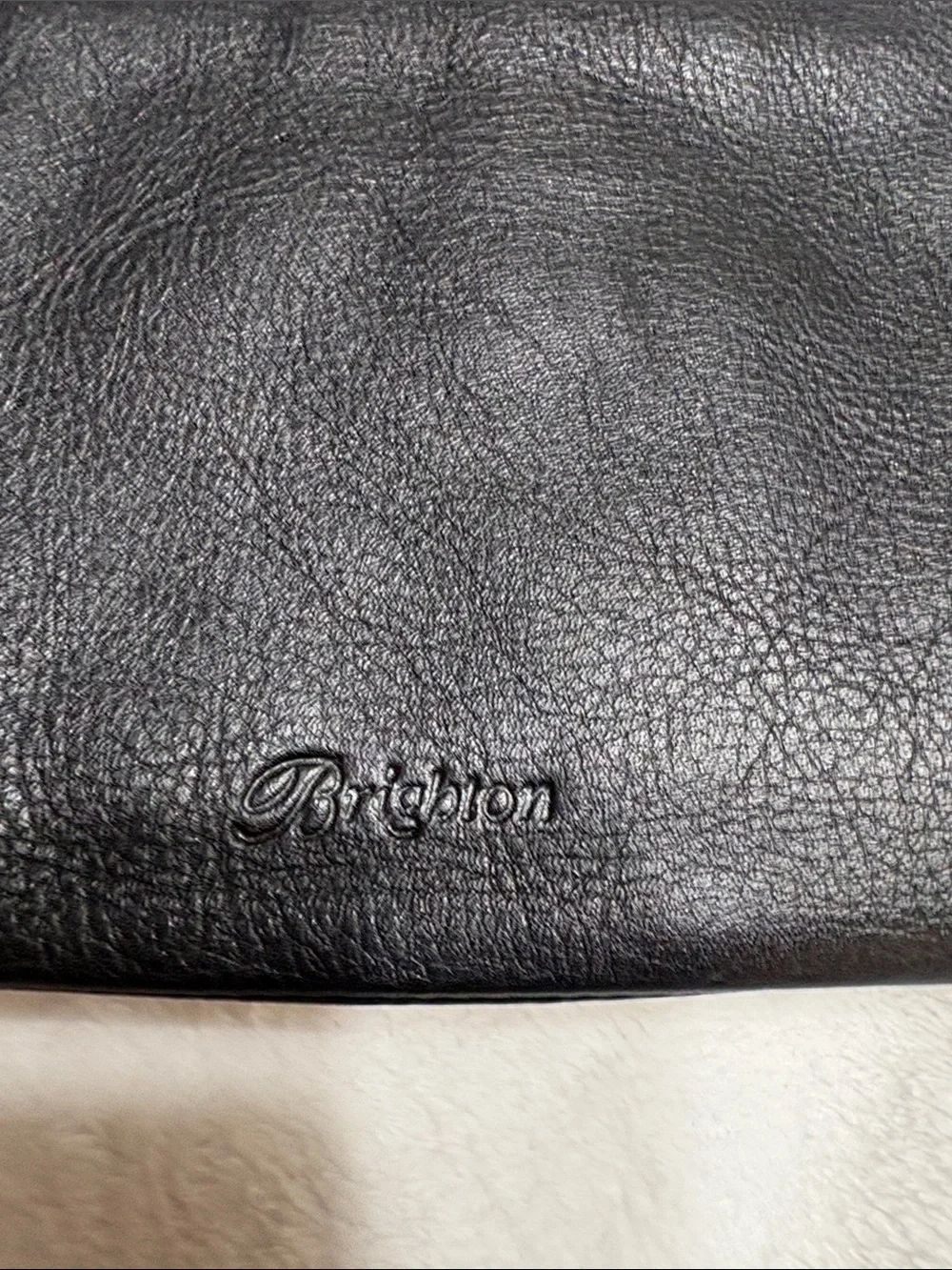 Brighton Cream Leather Zip Clutch with Black Medallion
